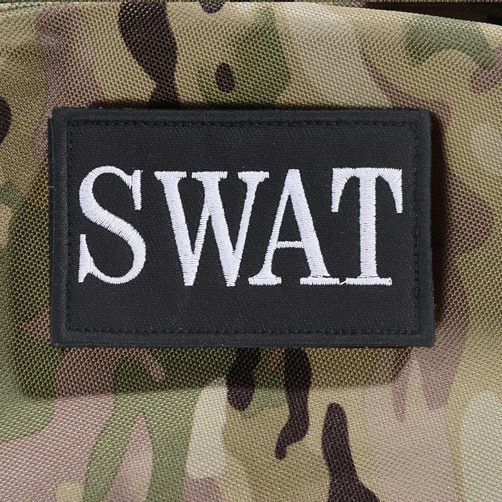 Authentic SWAT Embroidered Morale Patch - Durable High-Quality for Military Airsoft Paintball Gear - Camouflage Background