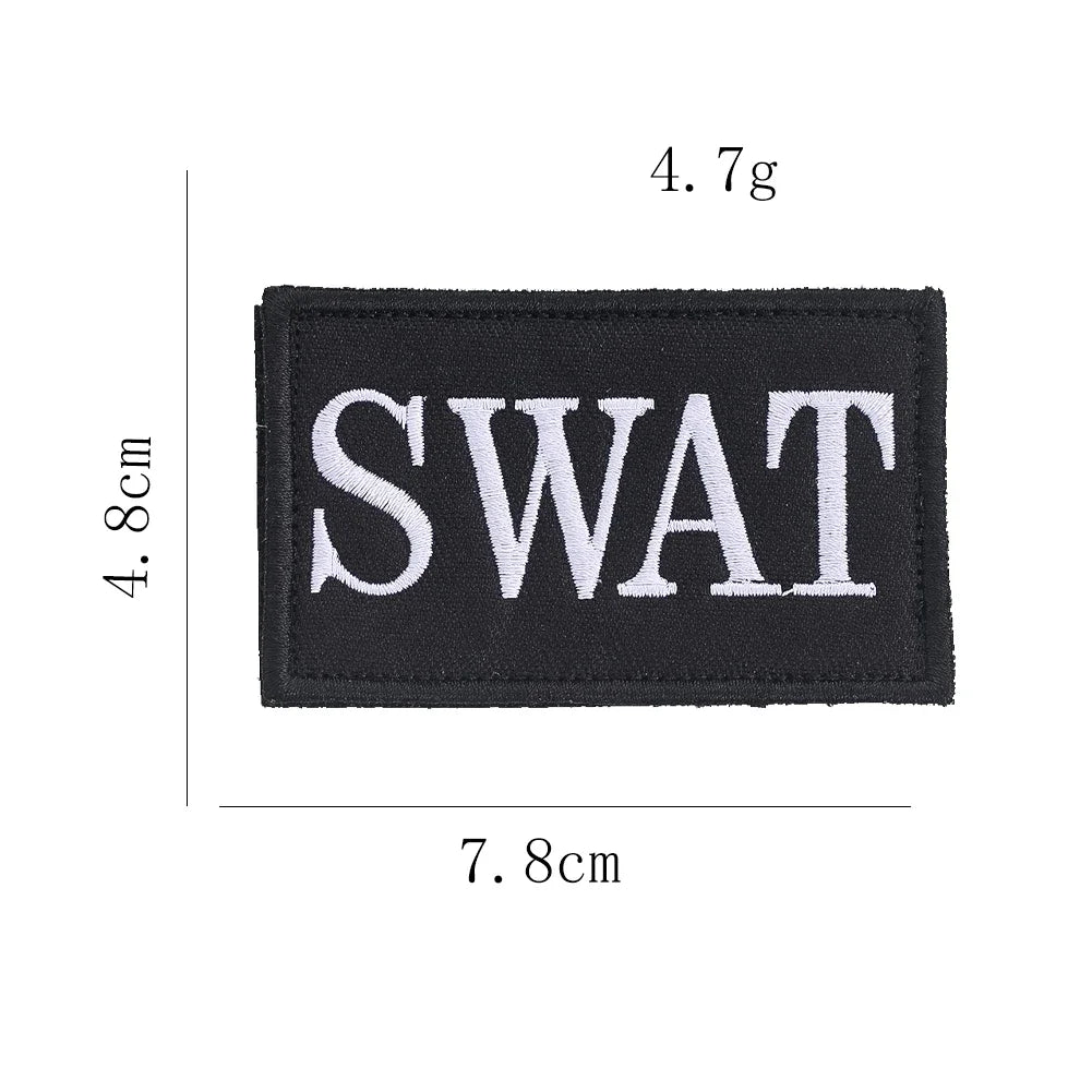 Authentic SWAT Embroidered Morale Patch - Durable High-Quality for Military Airsoft Paintball Gear - Camouflage Background