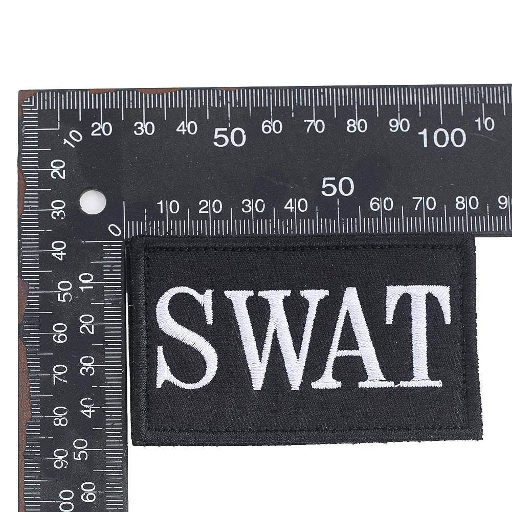 Authentic SWAT Embroidered Morale Patch - Durable High-Quality for Military Airsoft Paintball Gear - Camouflage Background